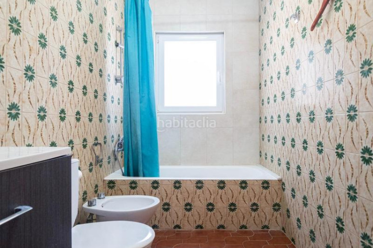 Casa  individual con jardín privado zona puig sec en Escala (L´)