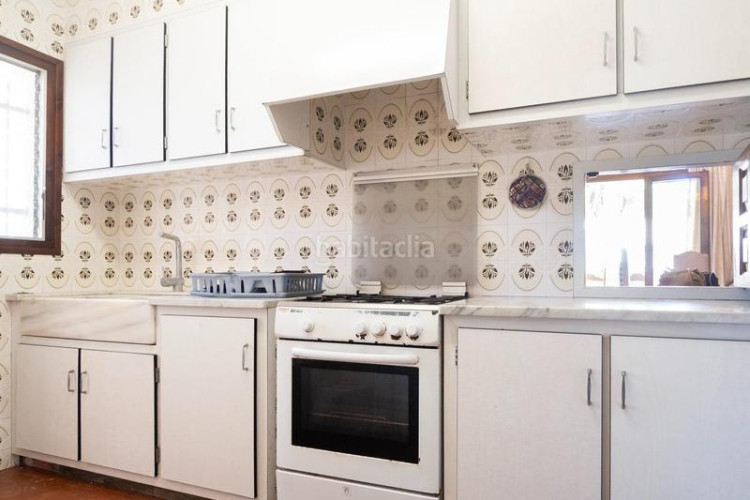 Casa  individual con jardín privado zona puig sec en Escala (L´)